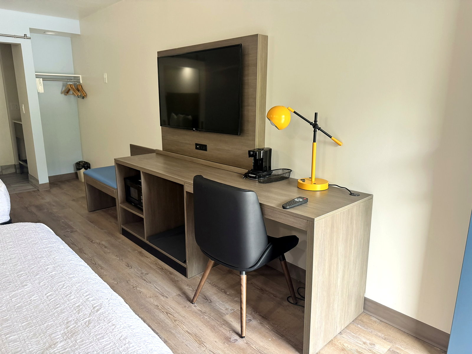 Desk and TV in room